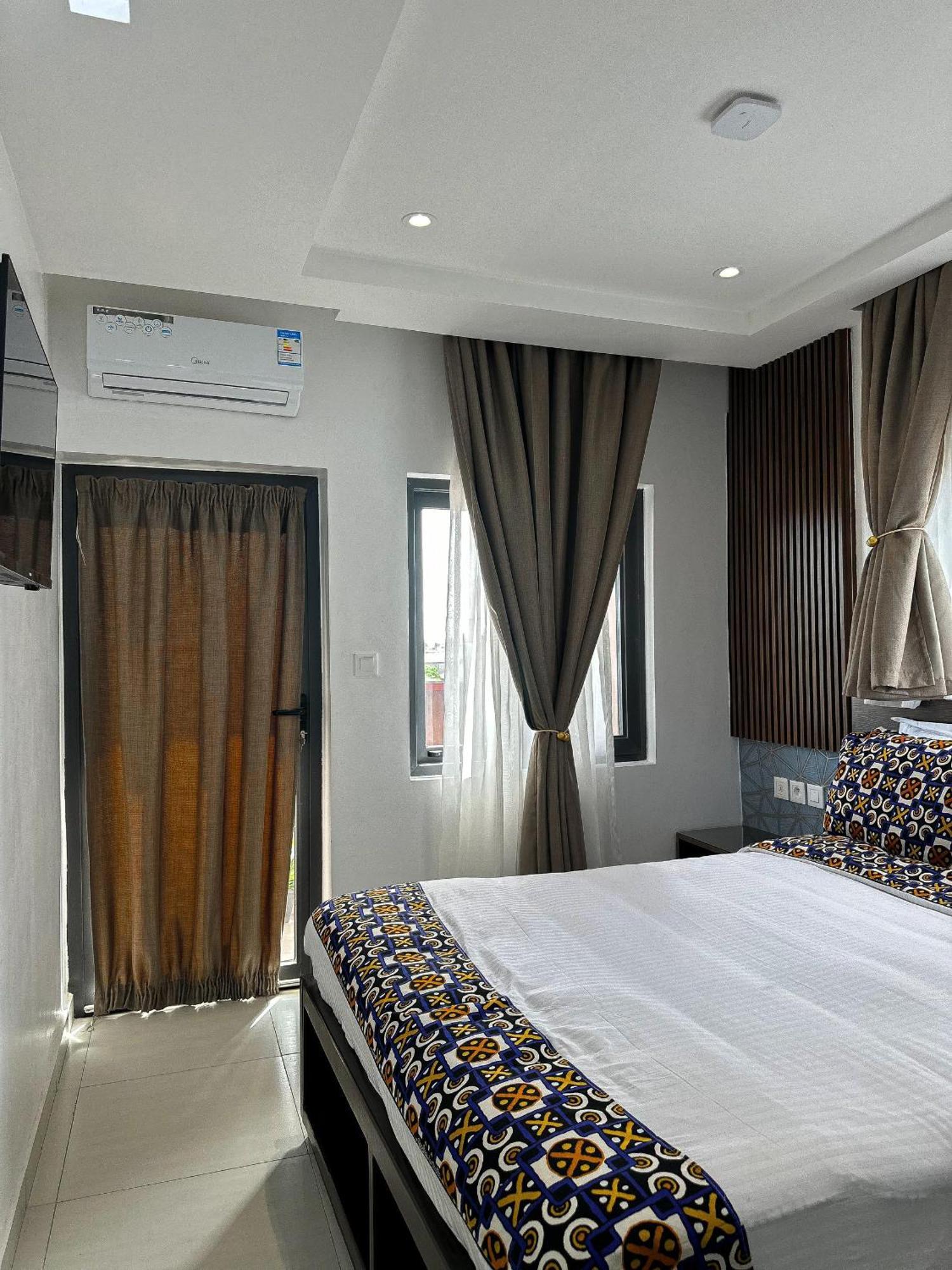 Klik Klak Appart Hotel Cotonou Buitenkant foto